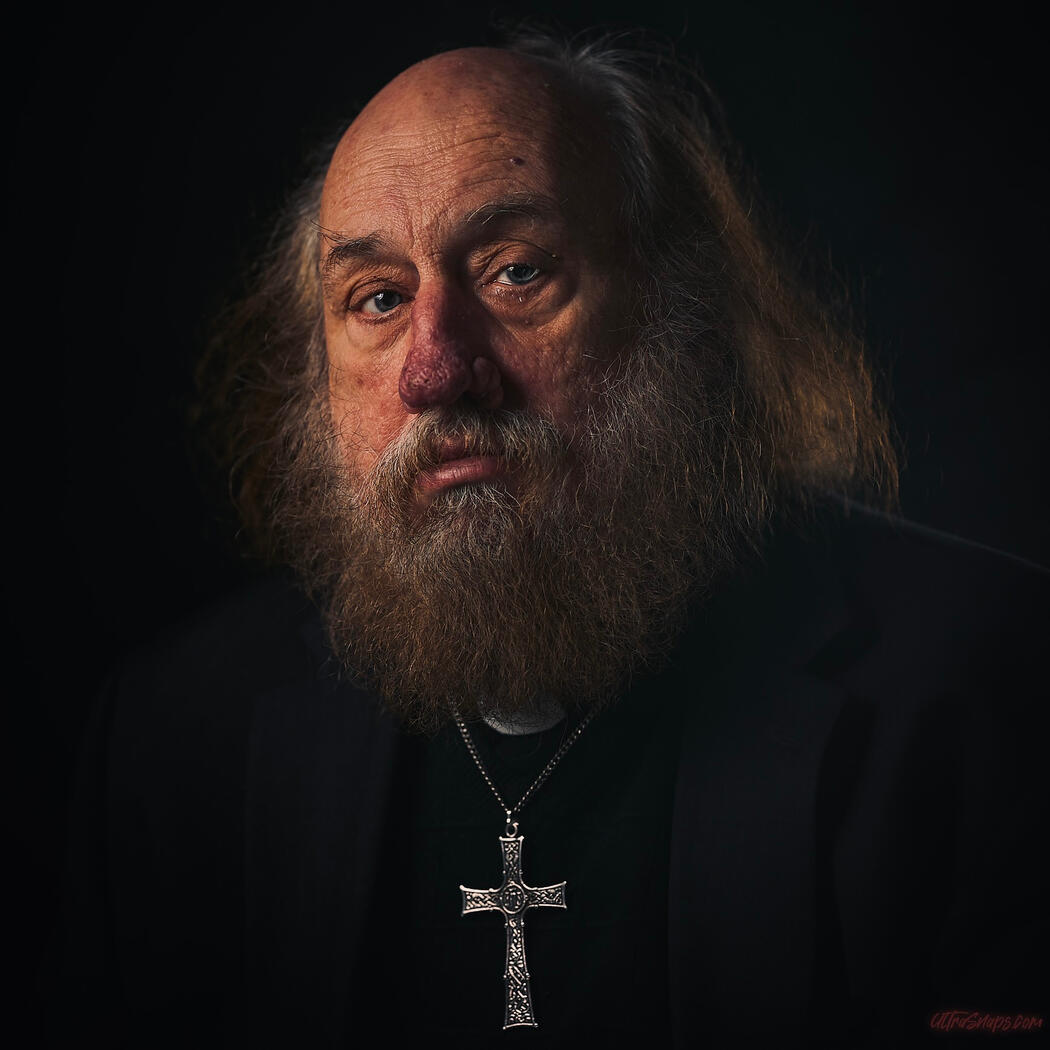 UltraSnaps Dramatic Studio headshot created to evoke a visceral reaction from the viewer, leaving a lasting impression that communicates the inner reality and each subject's "Ultra Ego"